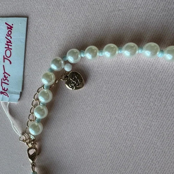 Betsey Johnson Cruise Control Faux Pearl
Seashell & Seahorse Pendant Necklace - Picture 5 of 10